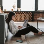 woman working at home with her laptop